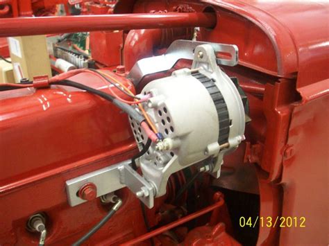 Check the photos for condition. . Farmall h 6 volt generator